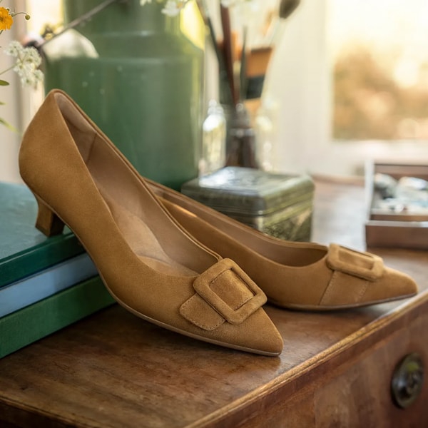 Featuring the Sadie kitten heel in tan suede.