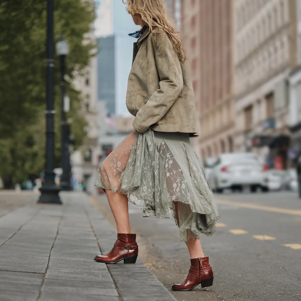 Featuring the Alessandra heeled bootie in brown.