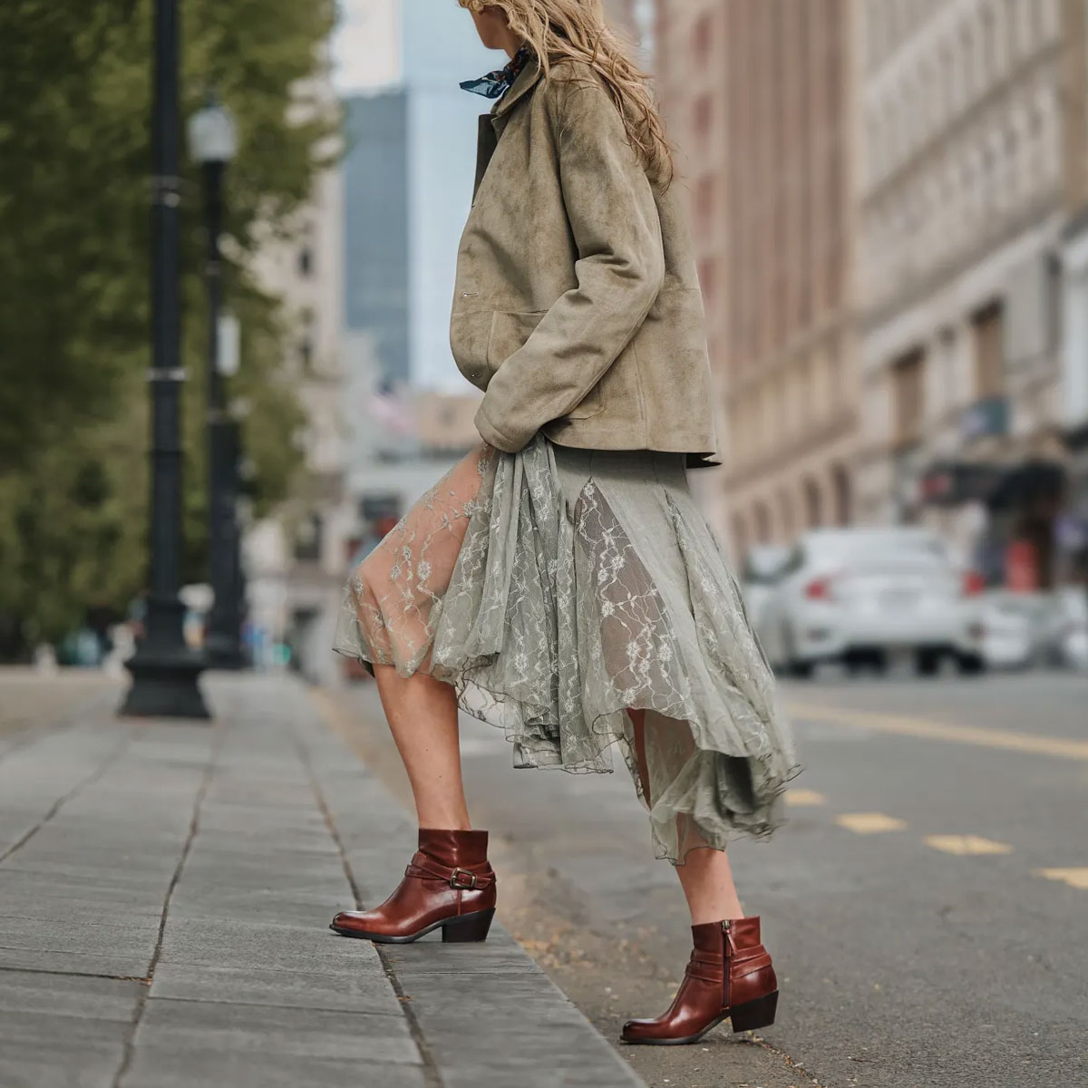 Featuring the Alessandra boot in brown.