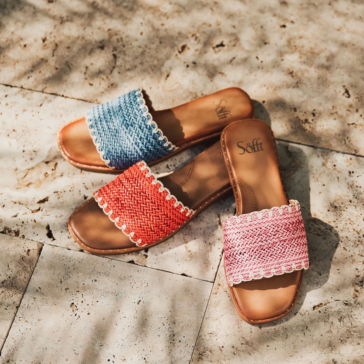 Featuring the Elsa sandal in blue, red and pink.