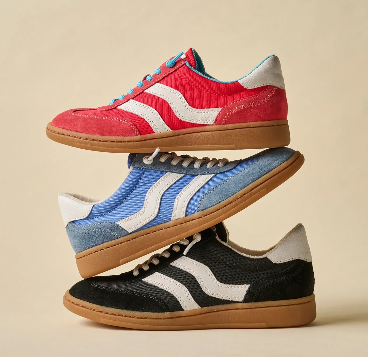Featuring the Remmi sneaker in red, blue and black.